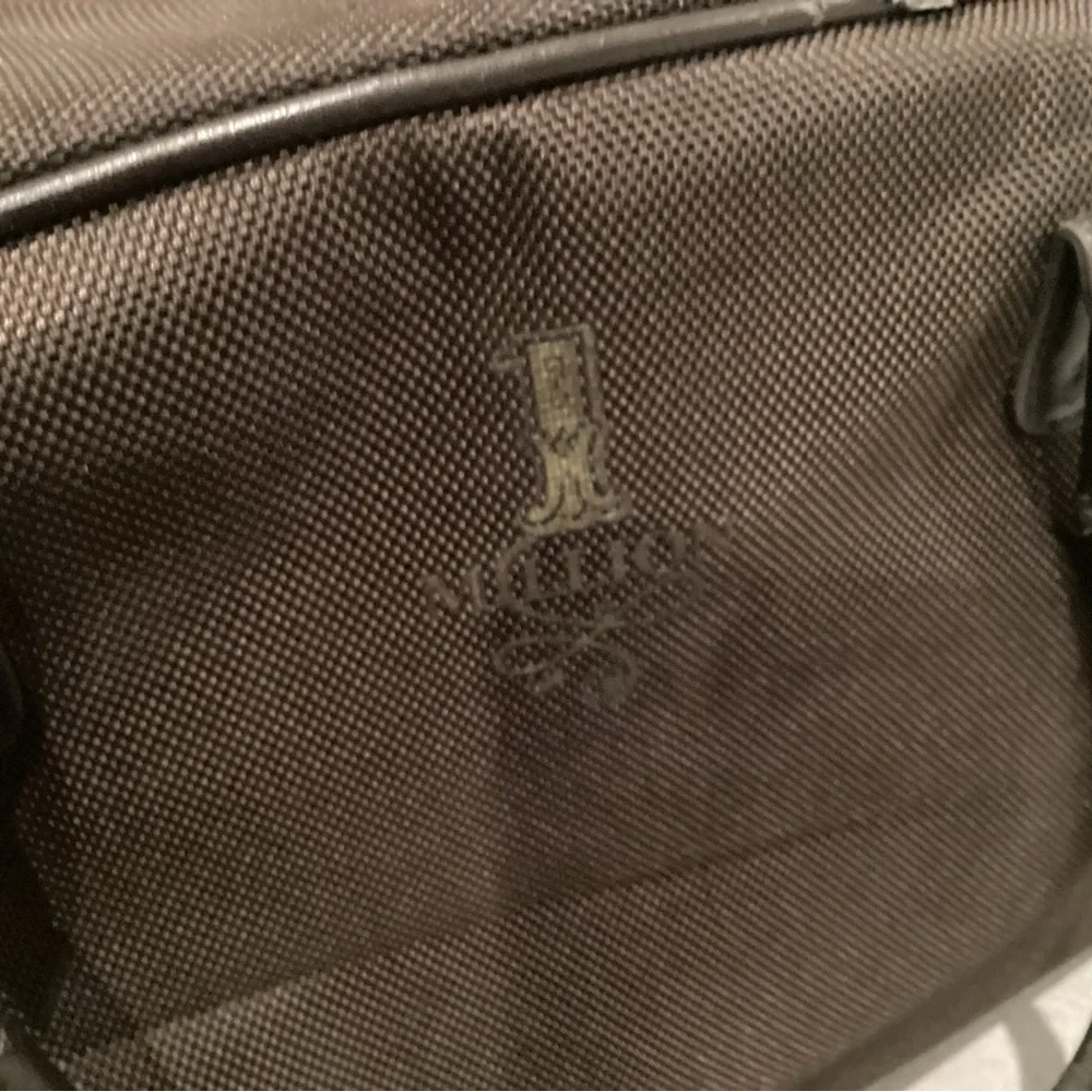 Paco Rabanne Brown Duffel Bag with Structured Design and Top Handles